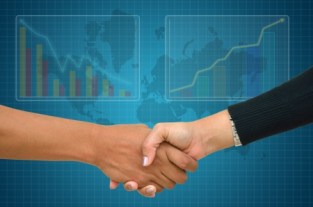 11746320 - businessman and businesswoman shaking hands